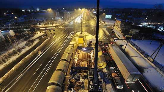 Hobas sewer pipes installed at night for WWTP Czajka, Poland